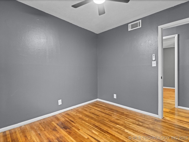 unfurnished room with light hardwood / wood-style floors and ceiling fan