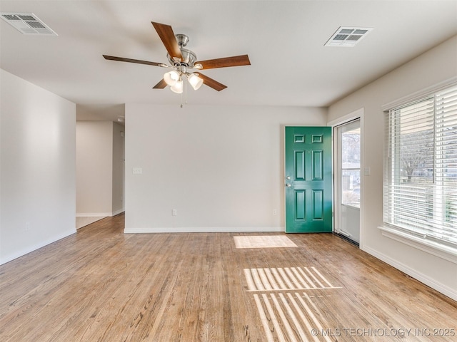 foyer featuring ceiling fan and light hardwood / wood-style floors