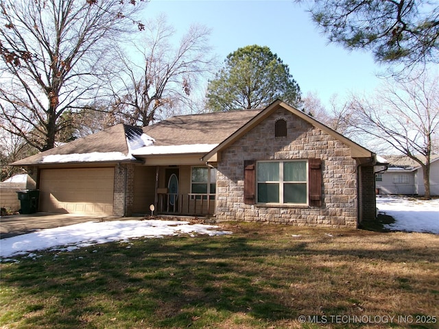 ranch-style home with a front lawn and a garage