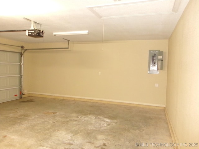 garage with a garage door opener and electric panel