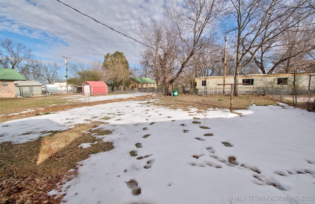 view of yard covered in snow