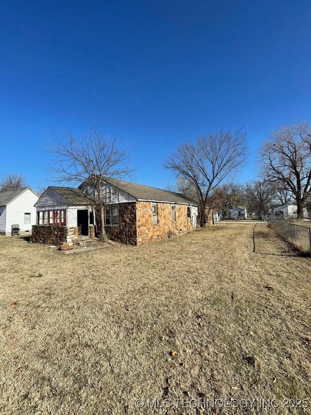 exterior space with a yard