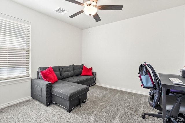 office area featuring ceiling fan and carpet