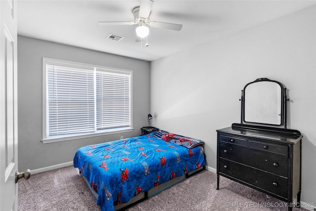 bedroom featuring ceiling fan and carpet flooring