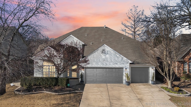 view of front of property featuring a garage