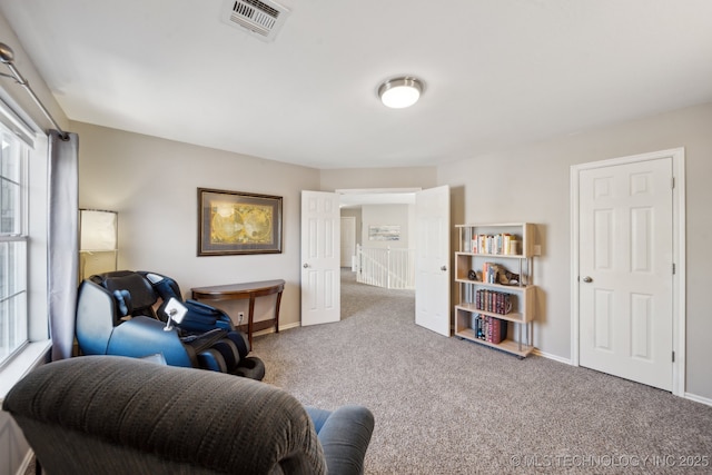 living area featuring carpet flooring