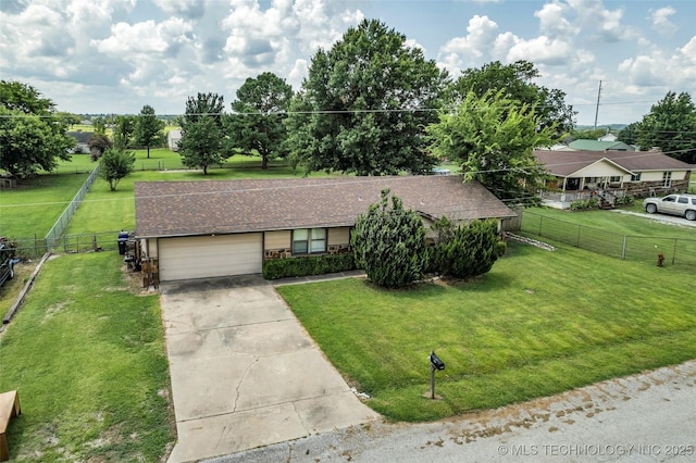 single story home featuring a front yard and a garage