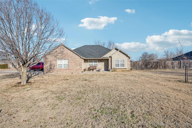 view of front of home with a front lawn