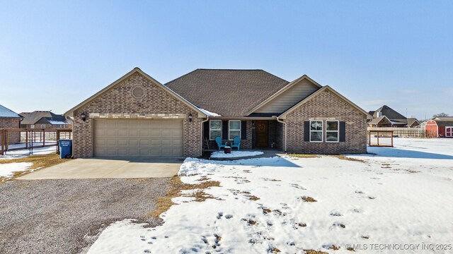 view of front of property with a garage