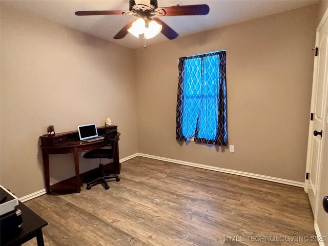 office area with ceiling fan and wood-type flooring