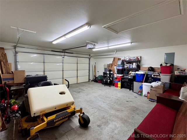 garage featuring a garage door opener