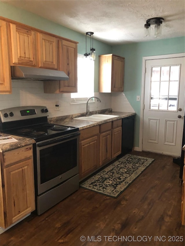 kitchen featuring electric stove, pendant lighting, dark wood-type flooring, sink, and black dishwasher