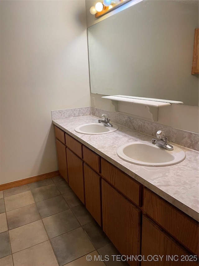 3031 N 430, Pryor, OK 74361 - bathroom with tile patterned flooring, a sink, baseboards, and double vanity