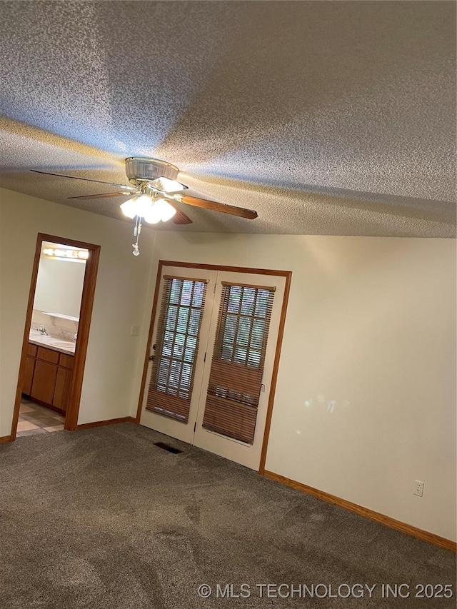 3031 N 430, Pryor, OK 74361 - spare room featuring carpet floors, a textured ceiling, ceiling fan, and baseboards