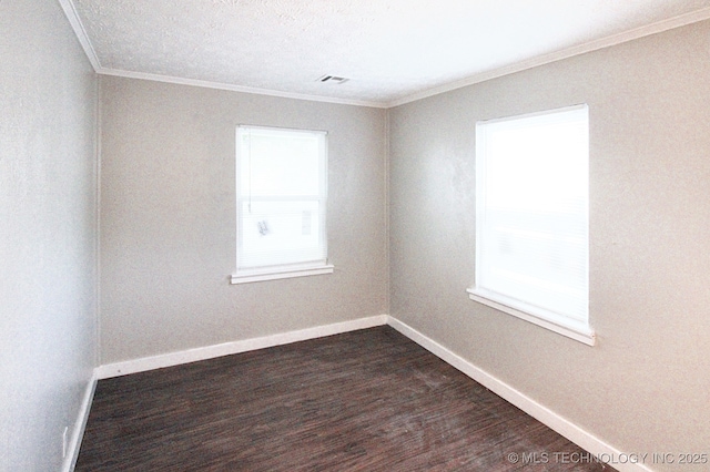 unfurnished room featuring dark wood-type flooring and ornamental molding