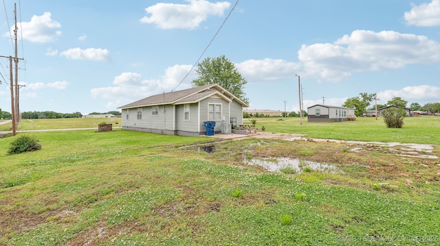 2019 Mckenzie Rd, Pawhuska, OK 74056 - view of grassy yard with central air condition unit