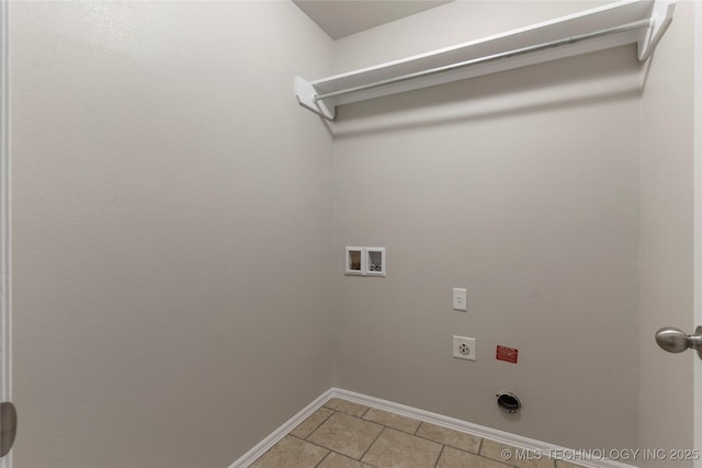 clothes washing area with washer hookup, light tile patterned floors, and hookup for an electric dryer