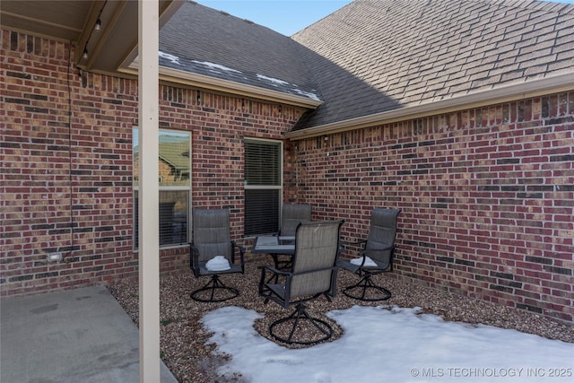 view of snow covered patio