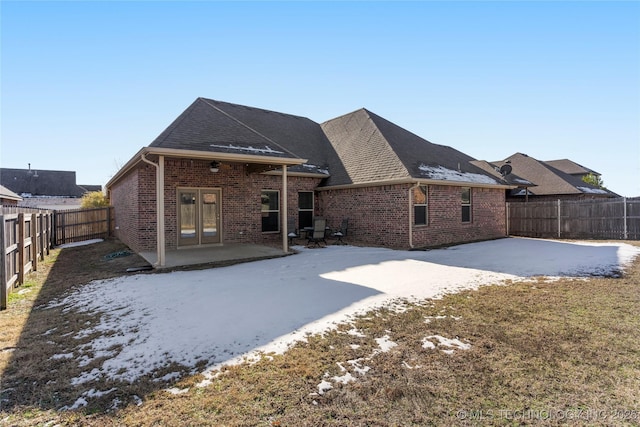 back of house featuring a patio