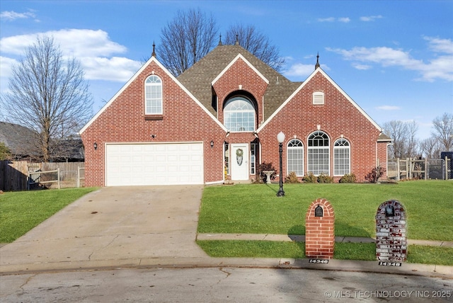 front facade with a garage and a front yard