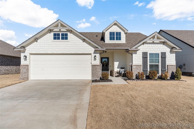 craftsman inspired home featuring a garage and a front lawn