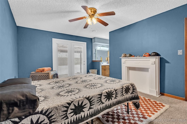 bedroom with carpet, ceiling fan, access to exterior, and a textured ceiling