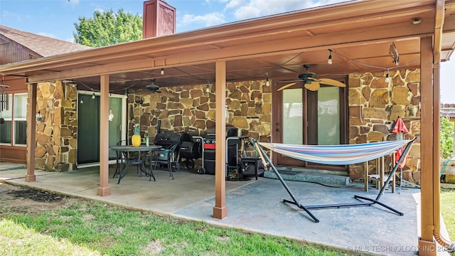 view of patio with ceiling fan