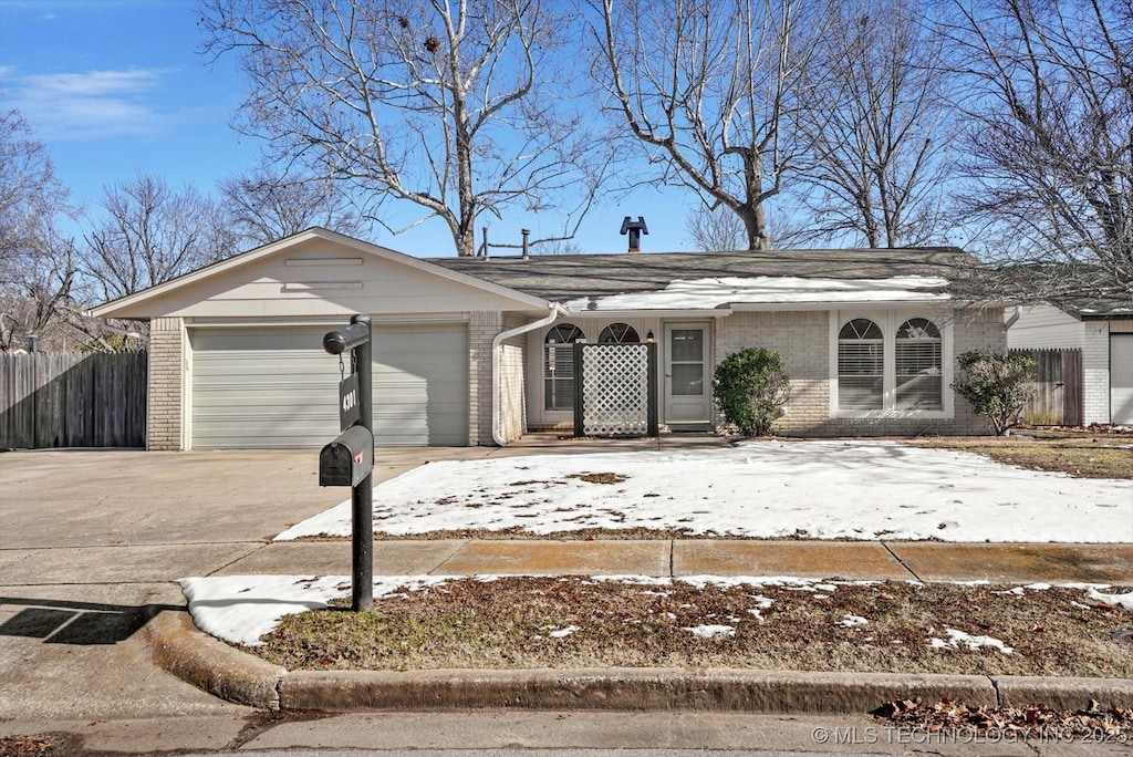 ranch-style house with a garage