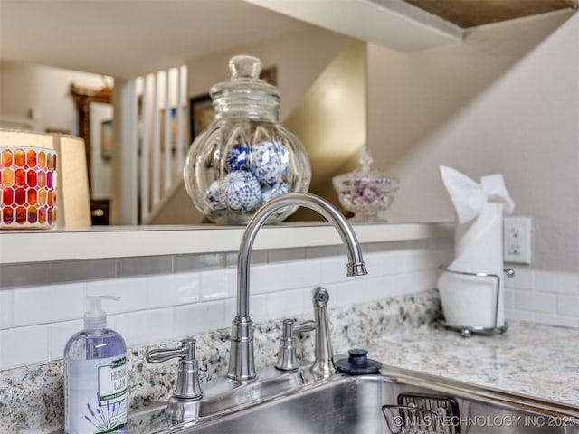 details with sink and tasteful backsplash