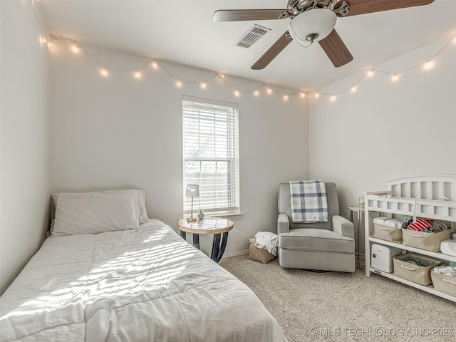 carpeted bedroom with ceiling fan