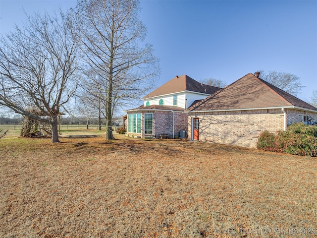 exterior space with a lawn