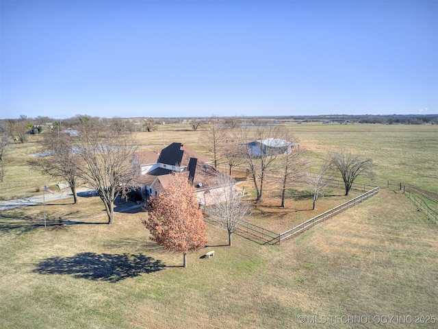 view of yard with a rural view