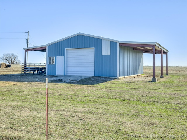 view of outdoor structure with a lawn