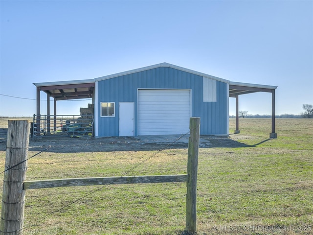 garage with a rural view