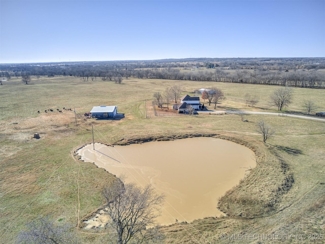 birds eye view of property featuring a rural view