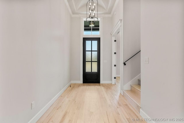 4006 S Dogwood Pl, Broken Arrow, OK 74012 - foyer entrance with ornamental molding, wood finished floors, stairway, baseboards, and a towering ceiling