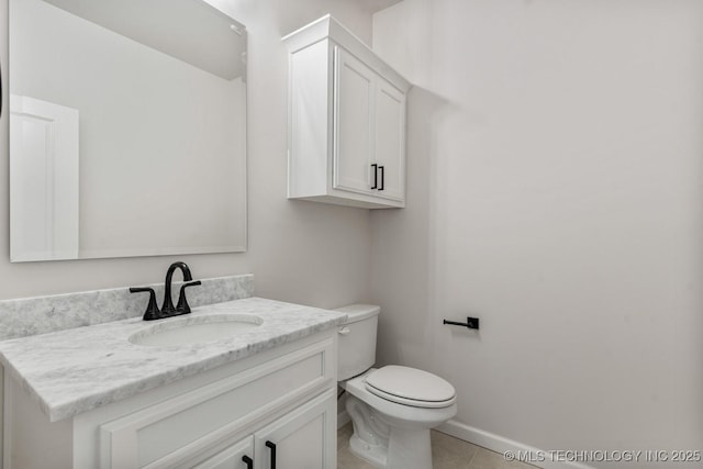 4006 S Dogwood Pl, Broken Arrow, OK 74012 - bathroom featuring vanity, toilet, tile patterned flooring, and baseboards