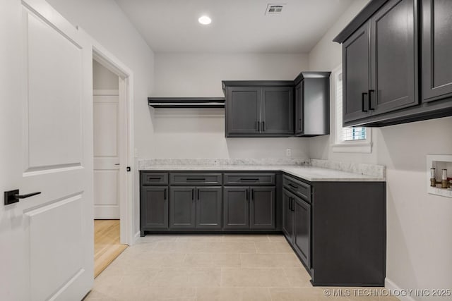 4006 S Dogwood Pl, Broken Arrow, OK 74012 - laundry area featuring cabinet space, hookup for a washing machine, baseboards, and recessed lighting