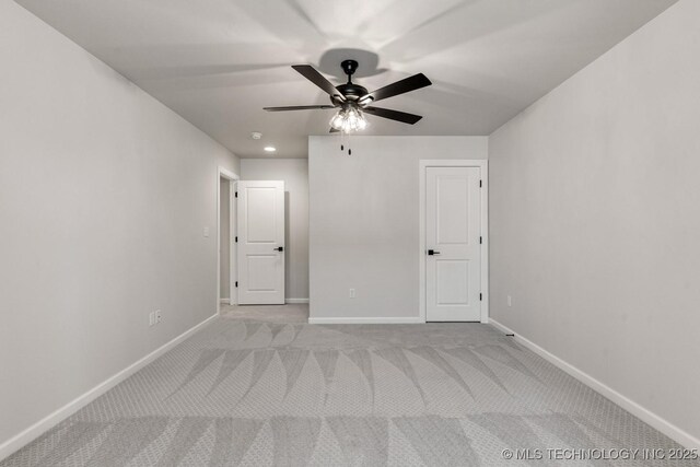 4006 S Dogwood Pl, Broken Arrow, OK 74012 - unfurnished bedroom featuring light carpet, baseboards, and ceiling fan