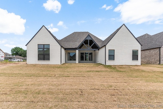 4006 S Dogwood Pl, Broken Arrow, OK 74012 - view of front of house featuring brick siding and a front lawn