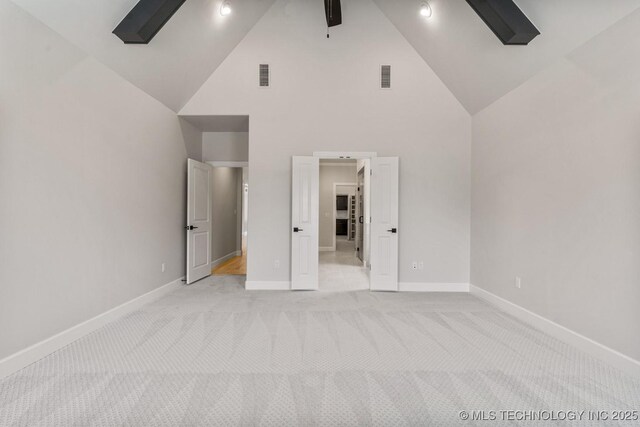 4006 S Dogwood Pl, Broken Arrow, OK 74012 - unfurnished bedroom featuring high vaulted ceiling, light colored carpet, baseboards, a skylight, and ceiling fan