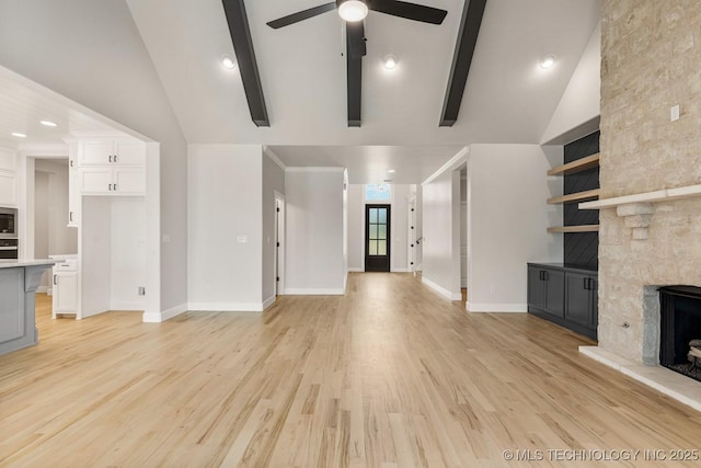 4006 S Dogwood Pl, Broken Arrow, OK 74012 - unfurnished living room with a fireplace, ceiling fan, high vaulted ceiling, light wood-style flooring, and baseboards