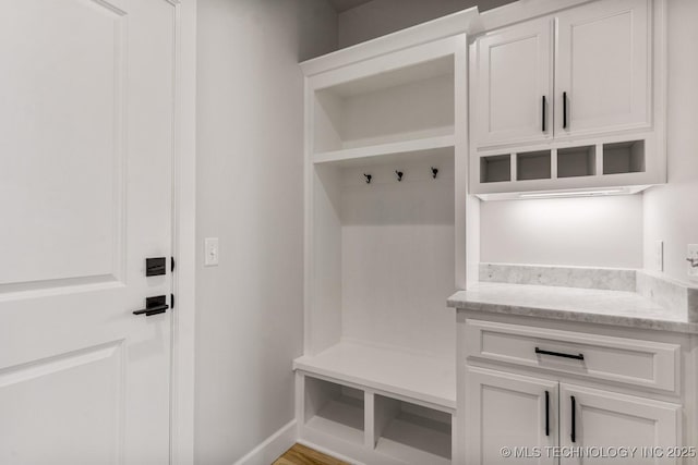 4006 S Dogwood Pl, Broken Arrow, OK 74012 - mudroom featuring baseboards and wood finished floors