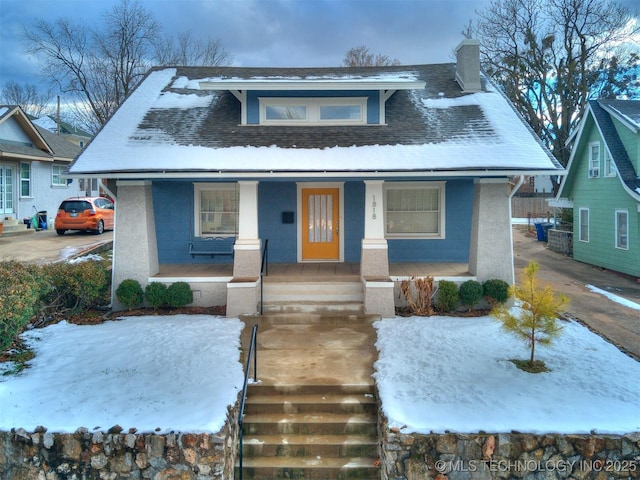 view of front of house with covered porch