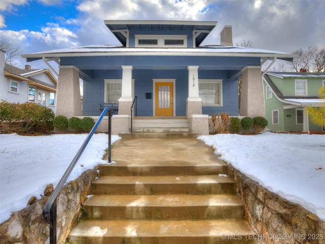 view of front of home with covered porch