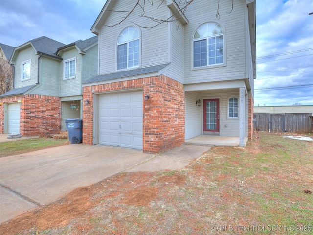 view of front of property with a garage