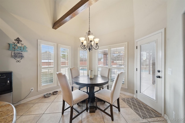 dining room featuring light tile patterned flooring, an inviting chandelier, and beamed ceiling