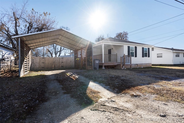 view of front of house featuring a carport