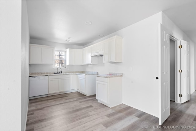 kitchen featuring sink, white cabinetry, dishwasher, and light hardwood / wood-style floors