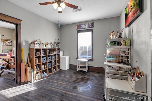 miscellaneous room featuring dark wood-type flooring and ceiling fan